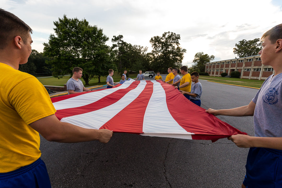 cadets folding american flag