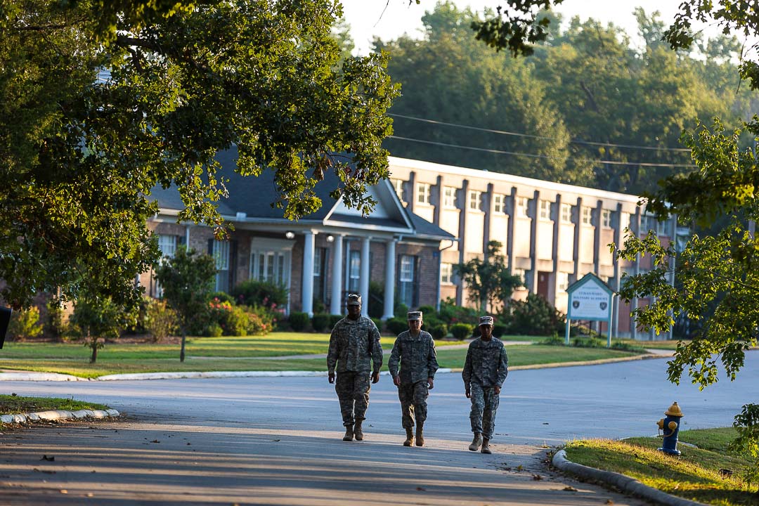 three cadets in camo