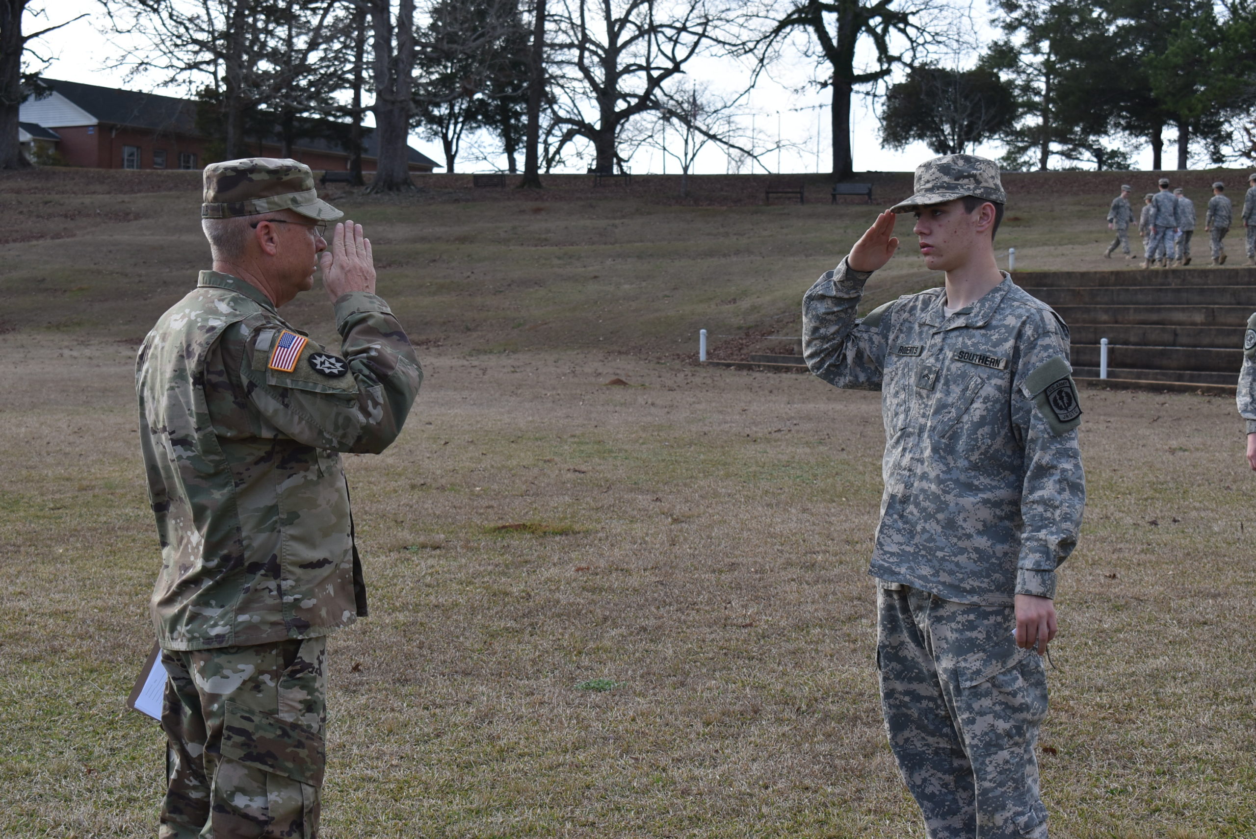 two saluting men