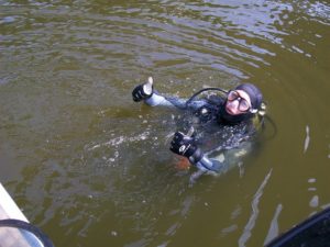scuba diver giving thumbs up