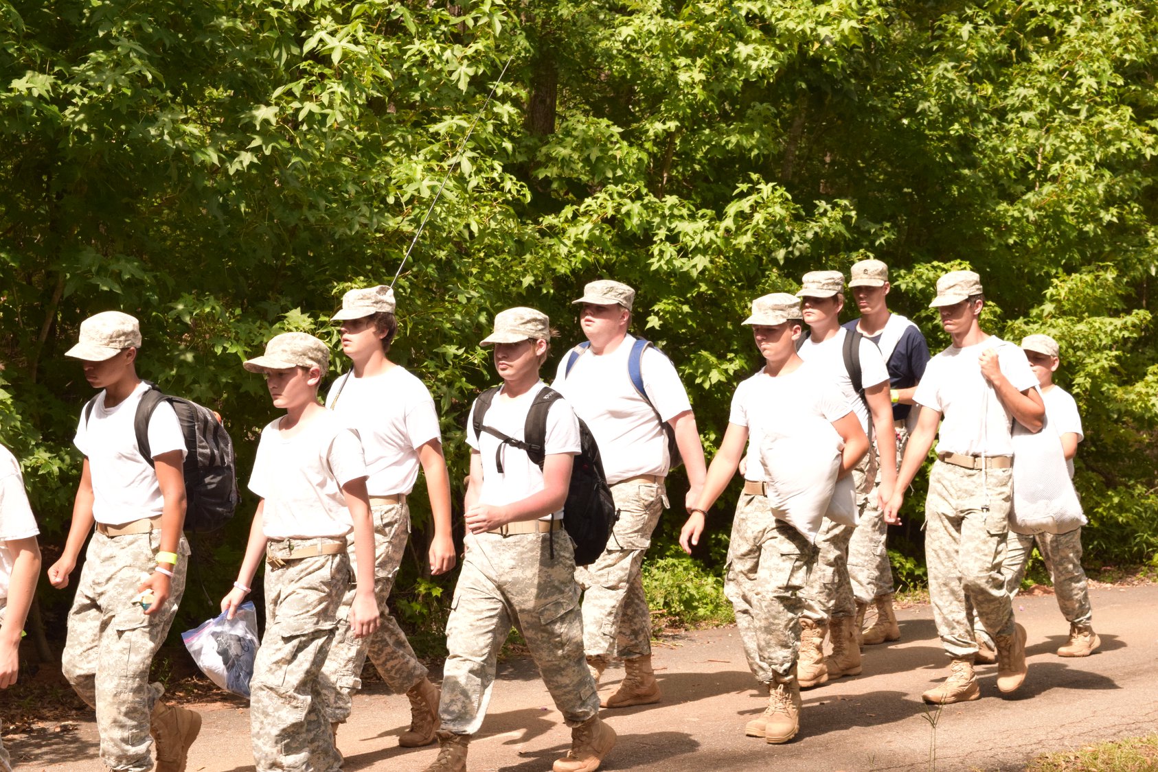 marching cadets in the woods